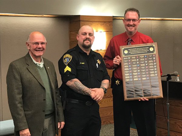 Plaque at Sheriff's Office Recognizes Employees Who Served in the Military