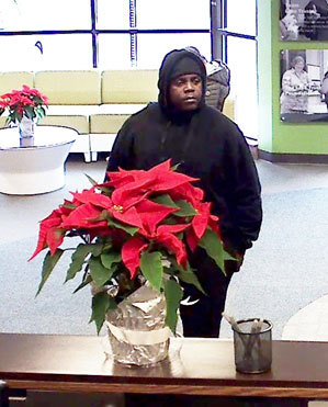 Suspect Sought In Lake Trust Credit Union Robbery