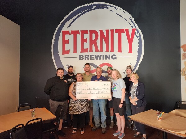 Brighton Optimists Present Checks To Severe Weather Network