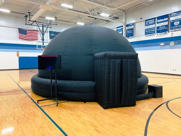 Local Students Take Test Run Of Inflatable NASA Planetarium