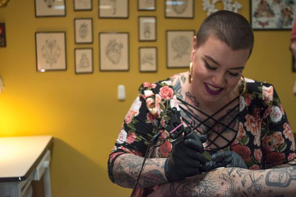 Carrie MetzCaporusso gains recognition for her roll flowers tattoos