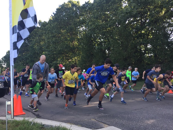 Runners Raise Funds And Remember Fallen Officer At Memorial 5.5K