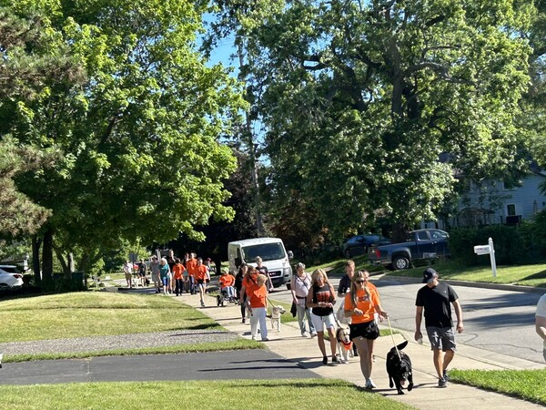 First Annual Brighton Pack of Dogs Pet Parade Termed a Success