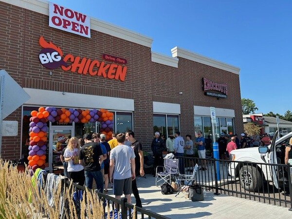 Customers line up for the grand opening of Big Chicken Hartland